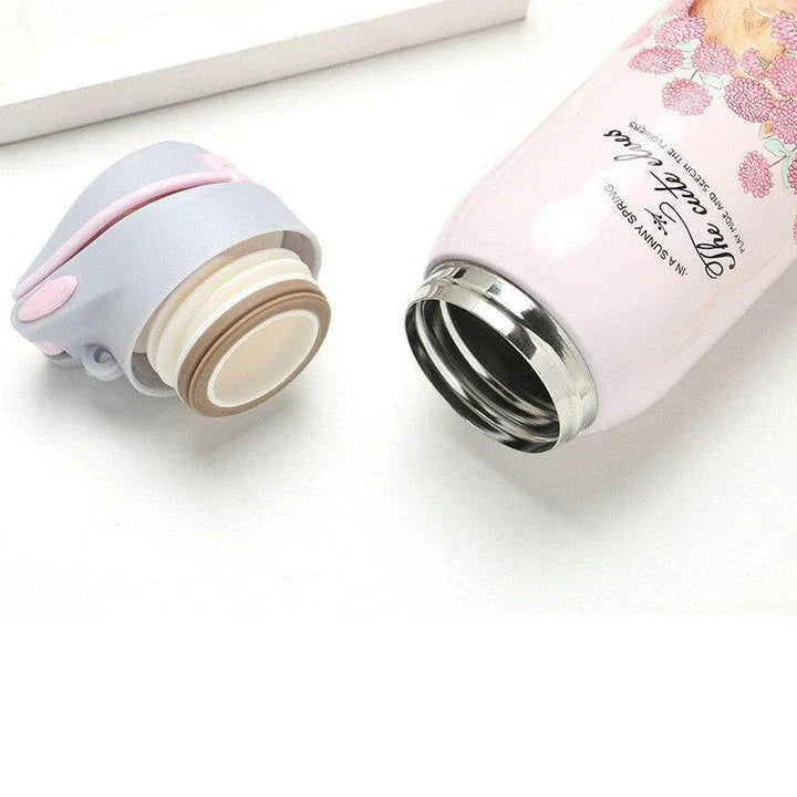 Elegant floral-patterned double-wall insulated water bottle with straw, perfect for keeping drinks chilled or warm for up to 12 hours