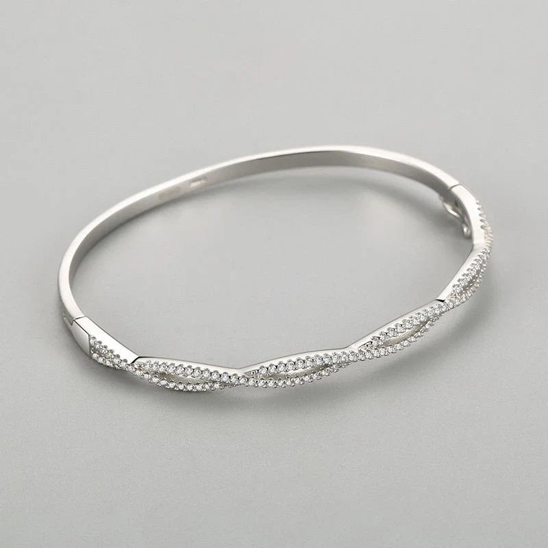 Silver bracelet with wave pattern, ideal for fashion-conscious women in the UK