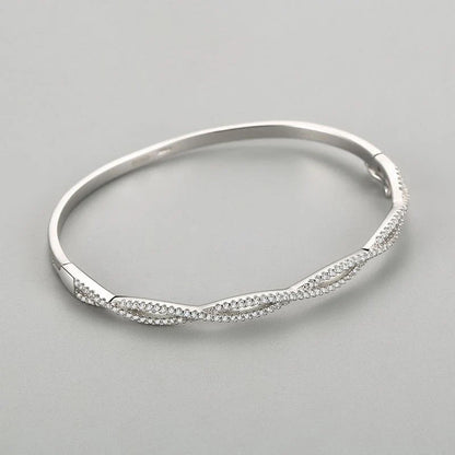 Silver bracelet with wave pattern, ideal for fashion-conscious women in the UK