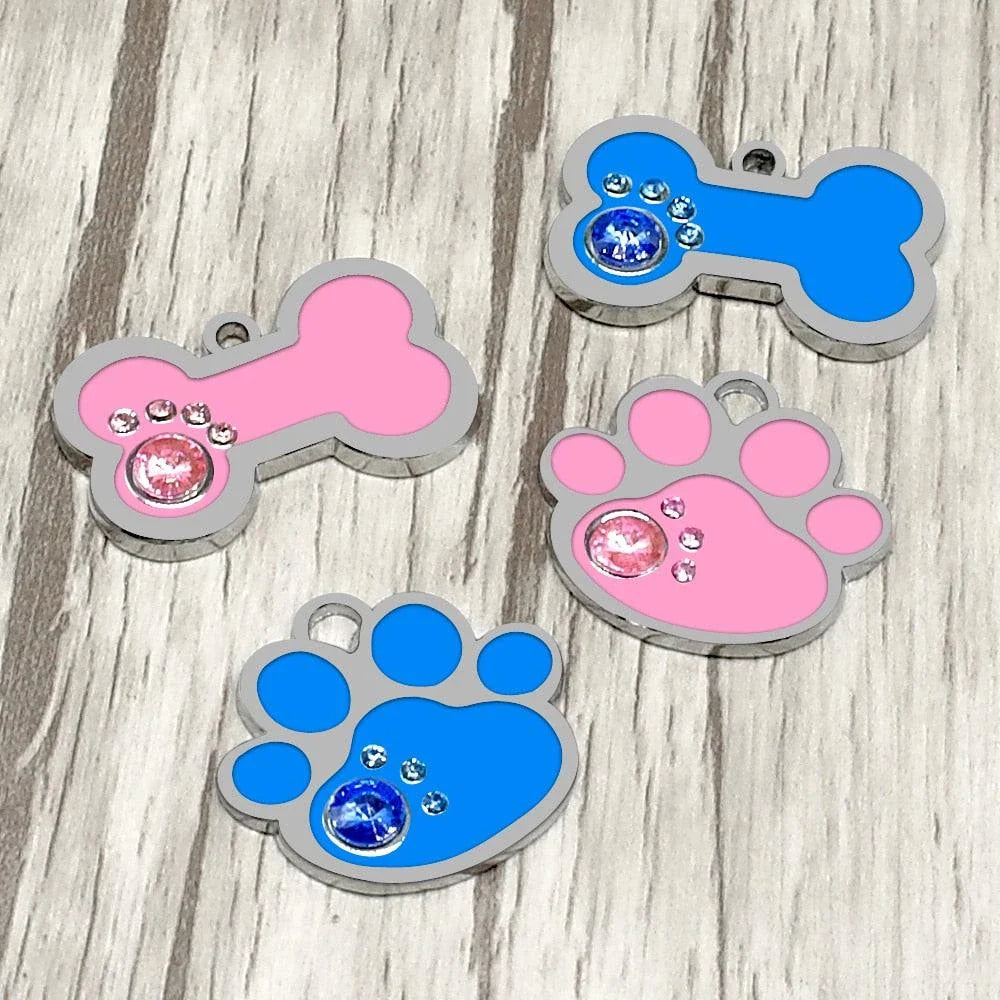 Customisable stainless steel pet ID tags in various colours, designed for identifying and protecting your beloved companion