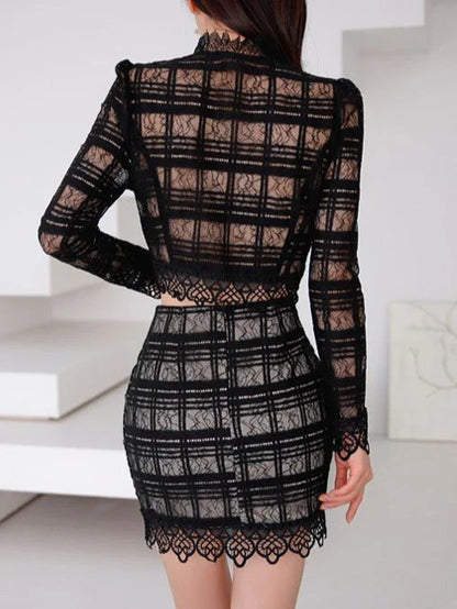 Elegant lace-trimmed two-piece suit with Chanel-inspired design and tailored stitching details