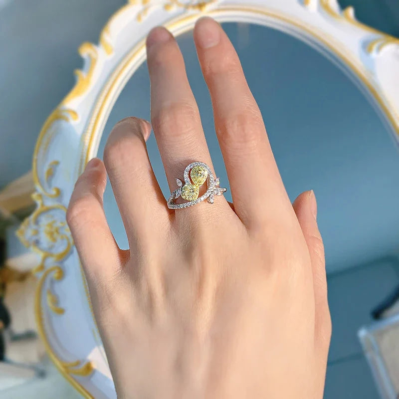 Elegant 925 silver ring with a yellow diamond, a timeless British accessory
