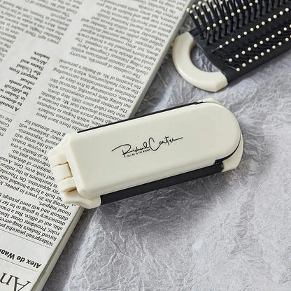 Compact, folding hairbrush with mirror and massage comb - a versatile grooming accessory for modern women