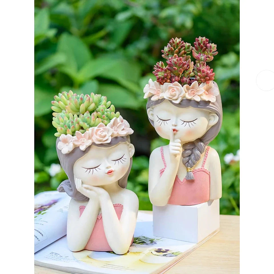 A charming 7.8-inch resin planter in the shape of a fairy girl, perfect for displaying succulents and adding whimsical decor to your home or office.