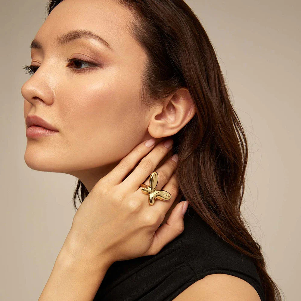 Trendha 18K gold-plated stainless steel butterfly ring, a durable and elegant accessory for UK special occasions