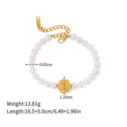 An elegant 18K gold-plated stainless steel bracelet featuring a flower ball design with a lustrous pearl centre