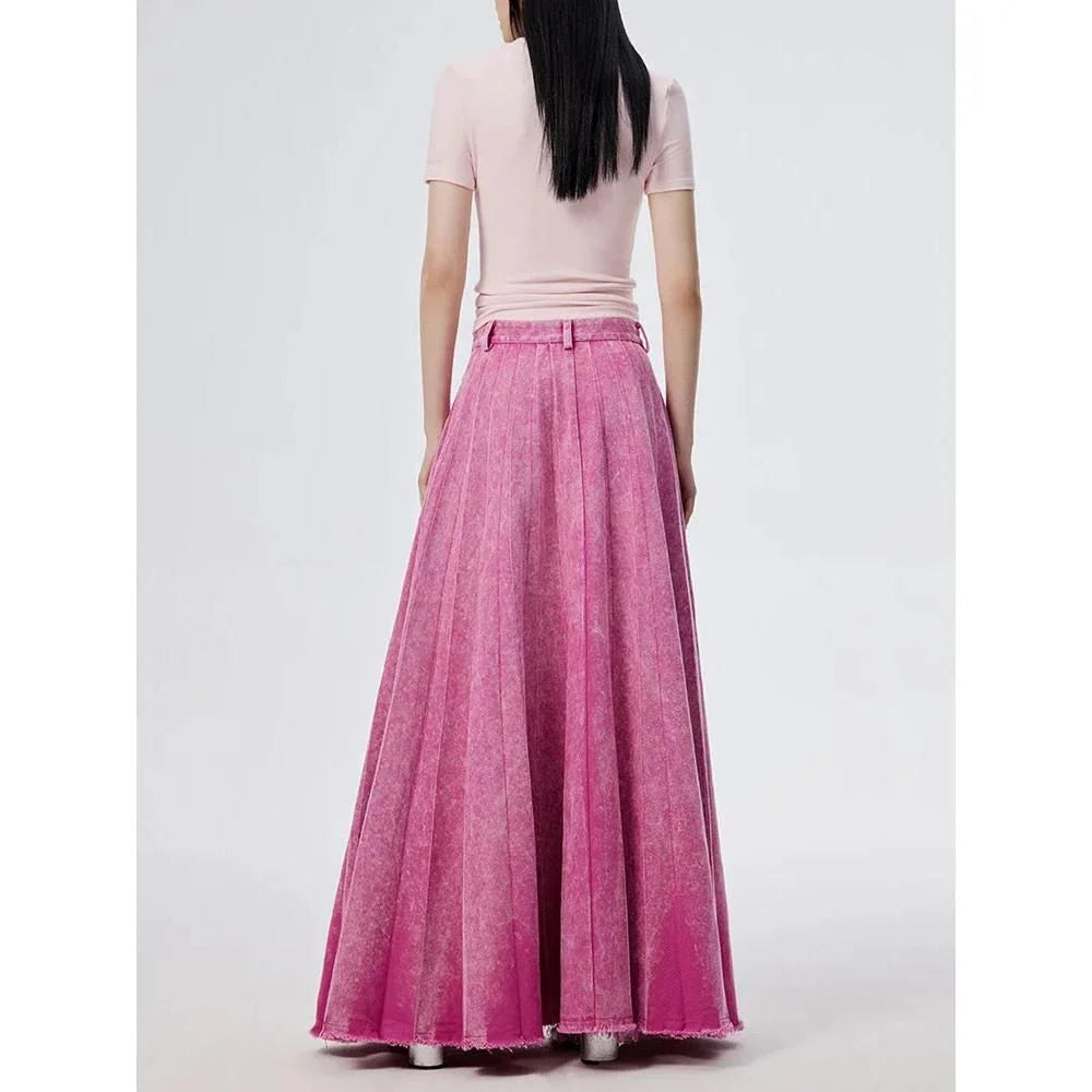 Elegant high-waist A-line denim skirt in a vibrant rose pink colour, perfect for any occasion.