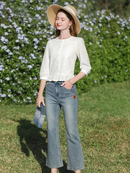 Elegant British-inspired white cotton puff sleeve blouse with a tailored regular fit and feminine flair