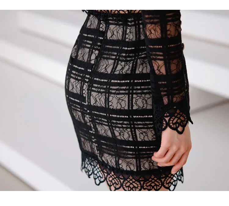 Elegant lace-trimmed two-piece suit with Chanel-inspired design and tailored stitching details
