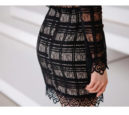 Elegant lace-trimmed two-piece suit with Chanel-inspired design and tailored stitching details
