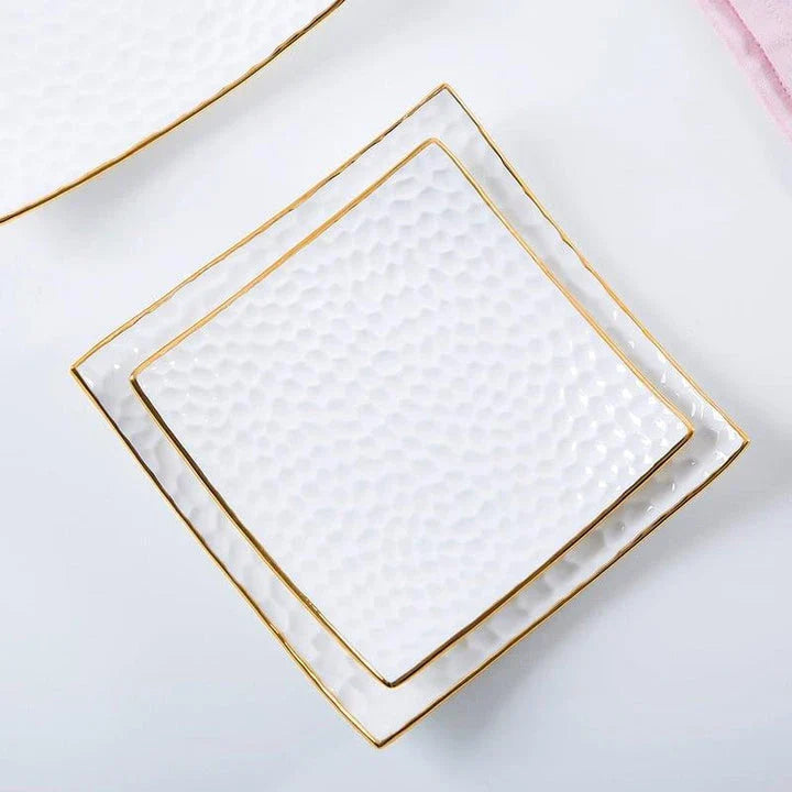 Elegant embossed ceramic cake plate in white color, perfect for serving cakes and pastries during afternoon tea