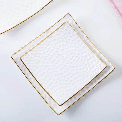 Elegant embossed ceramic cake plate in white color, perfect for serving cakes and pastries during afternoon tea