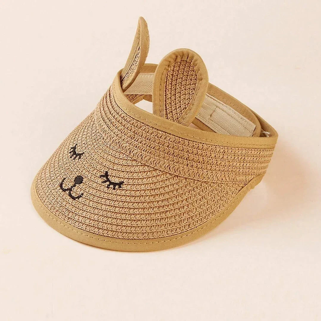 Rabbit-themed straw sun hat for kids with adjustable strap and foldable design for portability