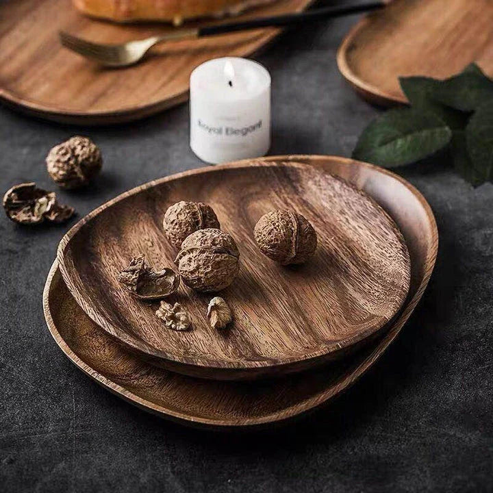Elegant wooden dining plates with a minimalist, laconic design and natural wood grain