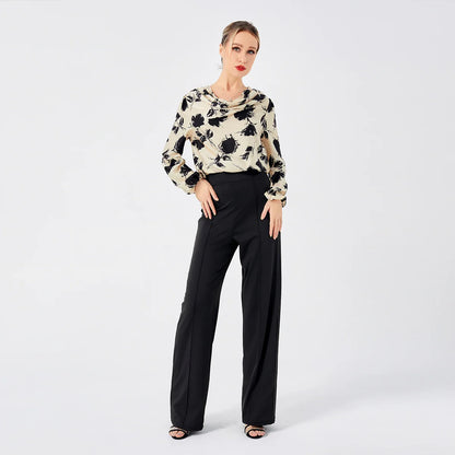 Elegant ladies' blouse with a printed pattern, dropped collar, and long sleeves in a classic white colour