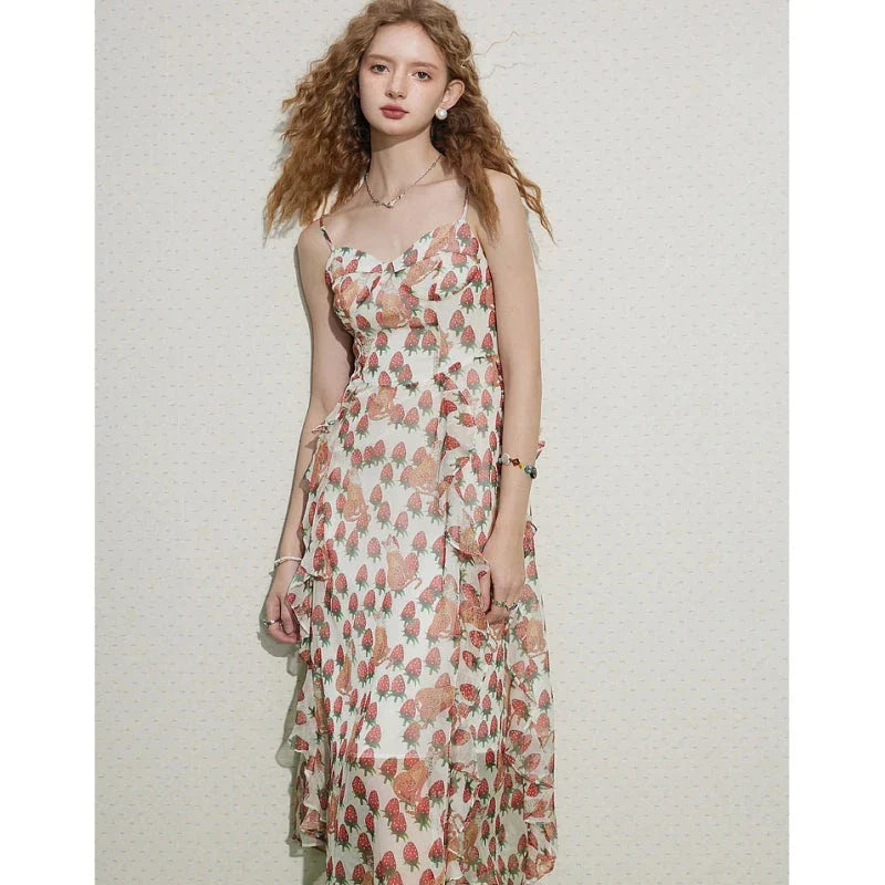 Elegant French-inspired midi dress with floral print, V-neck, and spaghetti straps