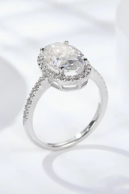 Elegant moissanite halo ring in polished sterling silver with a captivating 4.5-carat centre stone