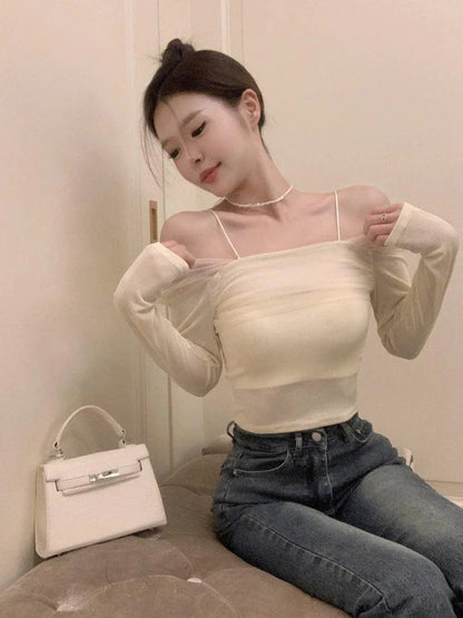 Elegant black off-shoulder blouse made of French-inspired polyester mesh fabric
