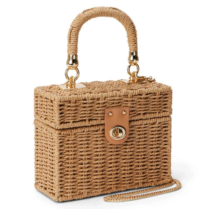 Handcrafted natural straw beach bag with bohemian-inspired design and detachable metal chain strap