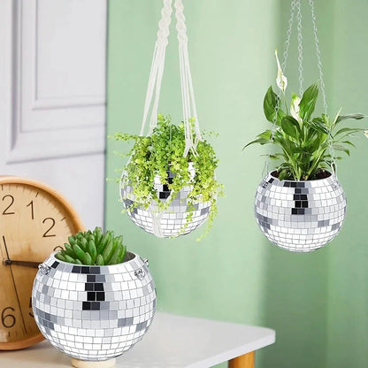 Decorative silver disco ball shaped hanging planter with reflective mirror accents for stylish indoor or outdoor decor