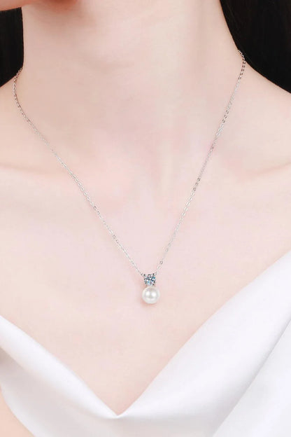 925 sterling silver necklace featuring freshwater pearls and a moissanite centre stone, a stunning piece of British-inspired jewellery