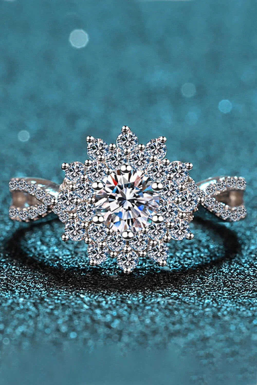 Elegant moissanite flower-inspired split-shank ring in sterling silver and platinum plating