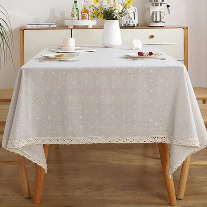 Elegant polyester linen tablecloth with delicate lace edging, available in various sizes for a sophisticated dining experience.