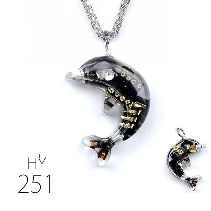 Steampunk-inspired dolphin pendant necklace with electronic components and brass accents