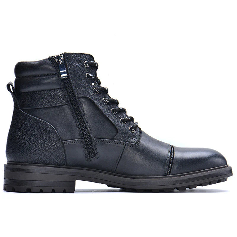 A pair of durable, stylish cowhide leather men's boots in a classic British design