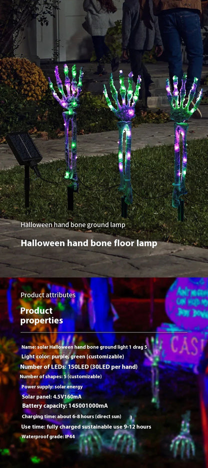 Solar-powered Halloween ground lamp with hand-shaped LED lights in purple and green colours, creating a spooky ambience in an outdoor courtyard