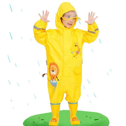 Children wearing a vibrant, dinosaur-themed waterproof rain jumpsuit playing outdoors in the rain