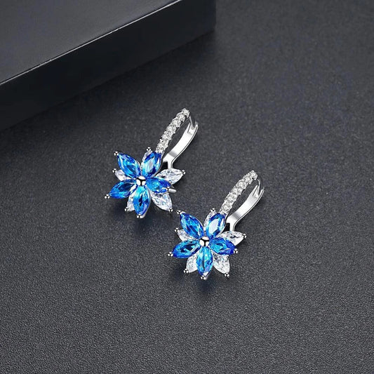 Elegant snowflake zircon earrings with a multicolour charm, crafted with premium copper for long-lasting wear and style.