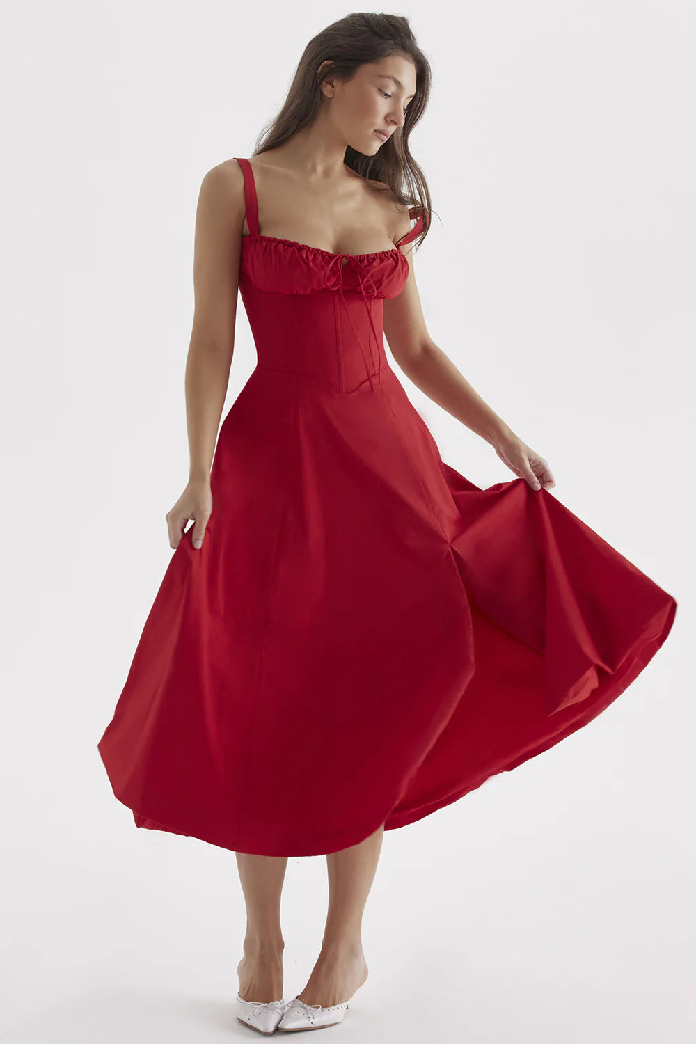 A stylish suspender dress made of premium polyester with a French high-split design, available in a range of vibrant solid colours for versatile summer wear.