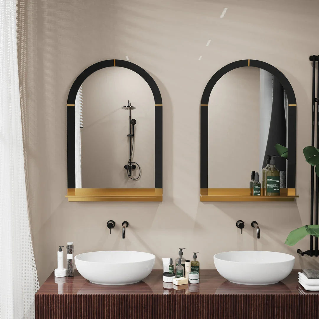 Elegant arched black and gold wall mirror with decorative shelf for home decor
