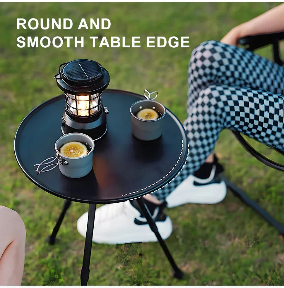 Adjustable ultralight portable camping round table with optional light stand, made from premium ABS and aluminium for durability and convenience