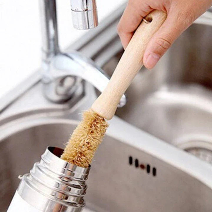 A set of eco-friendly kitchen cleaning brushes with wooden handles and sisal bristles, designed for effective and sustainable cleaning.