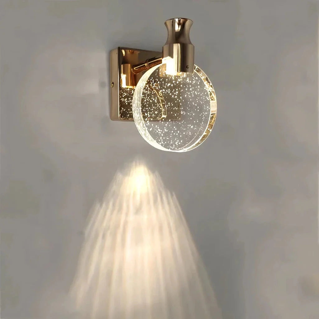 Elegant crystal LED wall lamp with copper body and glass shade, offering warm, cool, and neutral lighting modes for versatile home decor