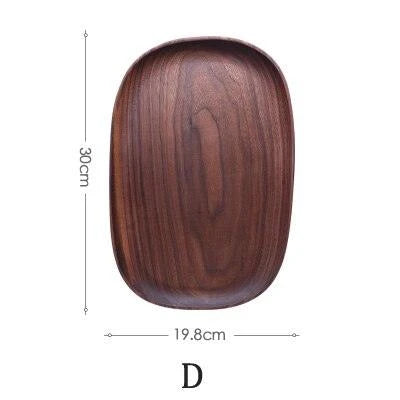 Elegant wooden dining plates with a minimalist, laconic design and natural wood grain