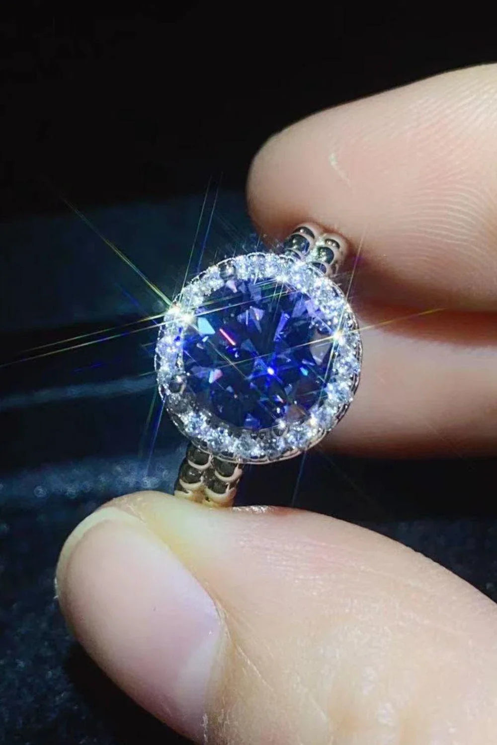 Elegant 2 carat moissanite engagement ring with a stunning royal blue centre stone and a durable 925 sterling silver band