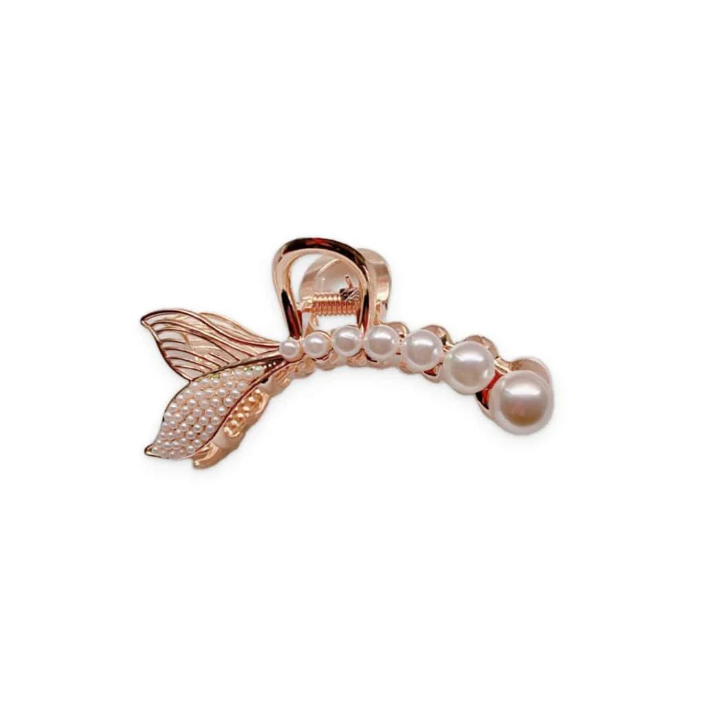Elegant gold-toned mermaid tail hair clips adorned with faux pearls, creating a captivating and enchanting accessory for mermaid lovers.