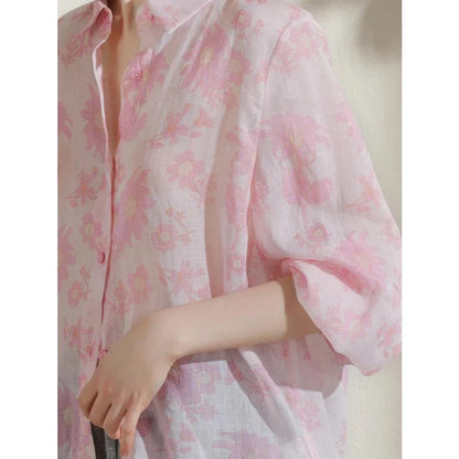 Elegant floral print ramie blouse for professional women, featuring a charming pattern, breathable fabric, and a polished silhouette.
