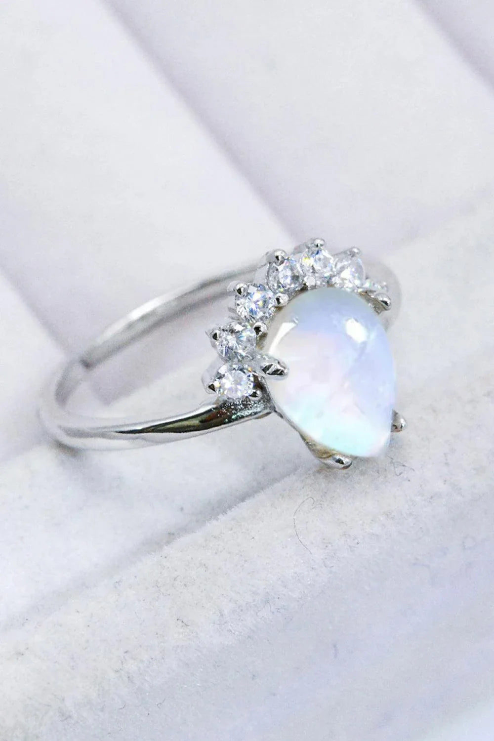 Elegant 925 sterling silver ring featuring a natural moonstone with a captivating blue-violet shimmer