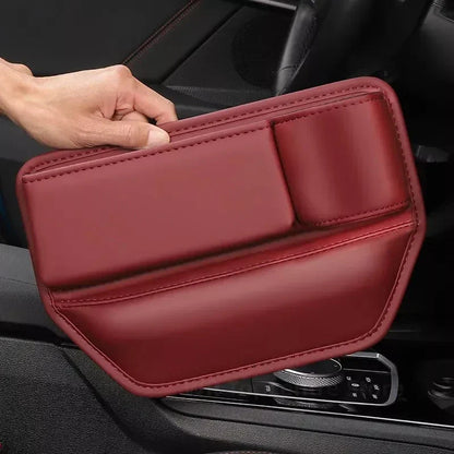 Leather Car Seat Gap Organiser with multiple storage compartments and cup holder, designed for easy installation and a sleek look in your vehicle.