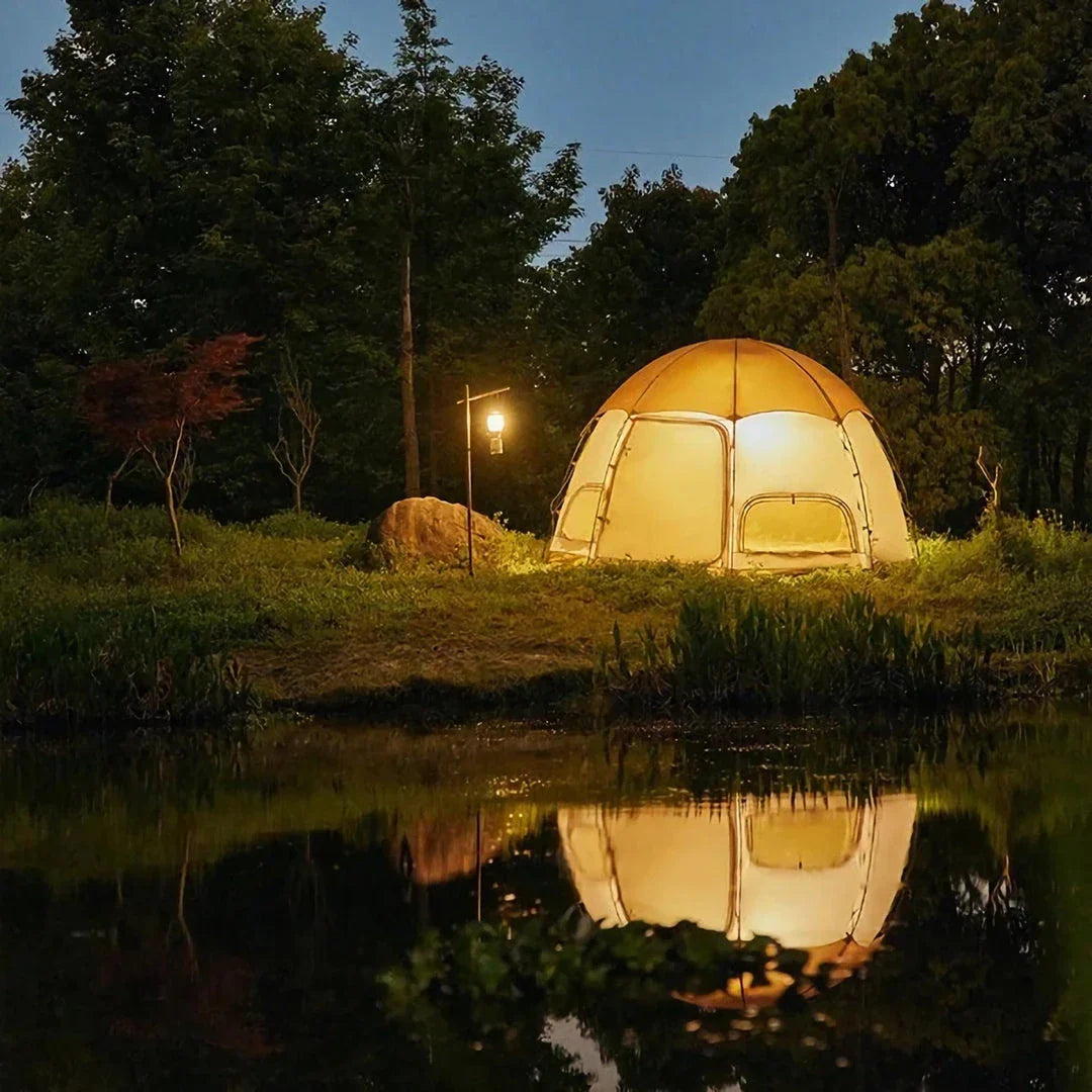 Spacious octagonal camping tent with multiple windows and a distinctive mushroom-shaped design