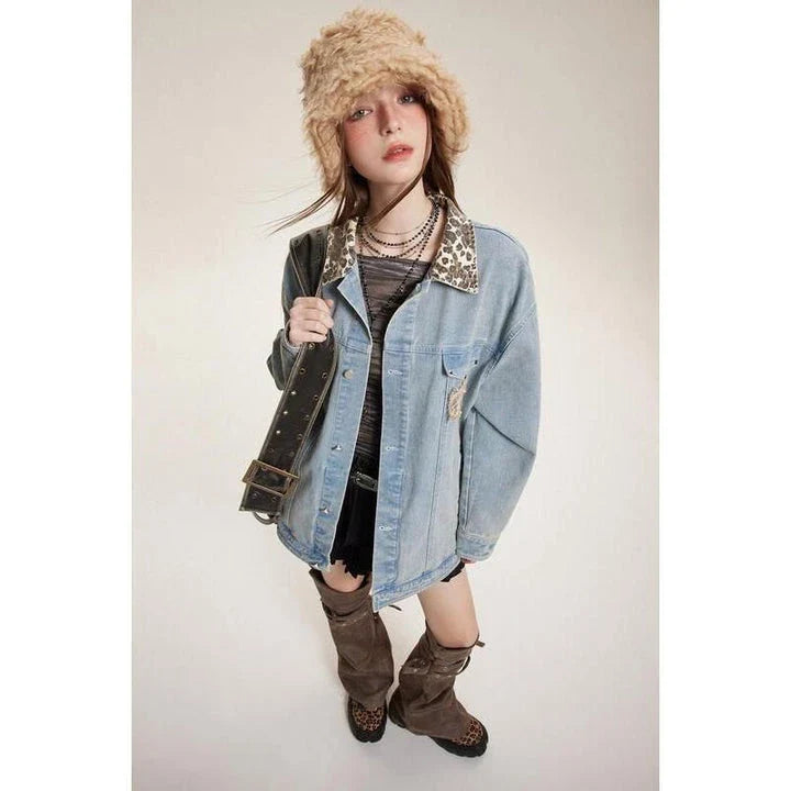 Stylish leopard-print denim jacket with a patchwork design, perfect for versatile fashion.
