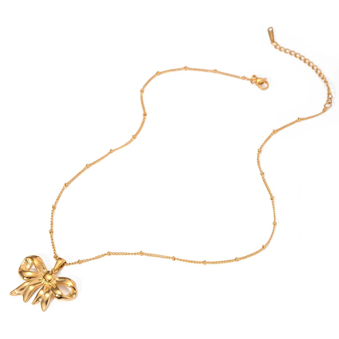 18K gold-plated stainless steel bowknot pendant necklace with sparkling zircon heart centre