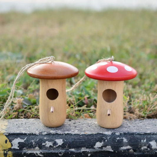 A charming wooden hummingbird nest designed for outdoor gardens, providing a safe and cozy home for these delightful birds.