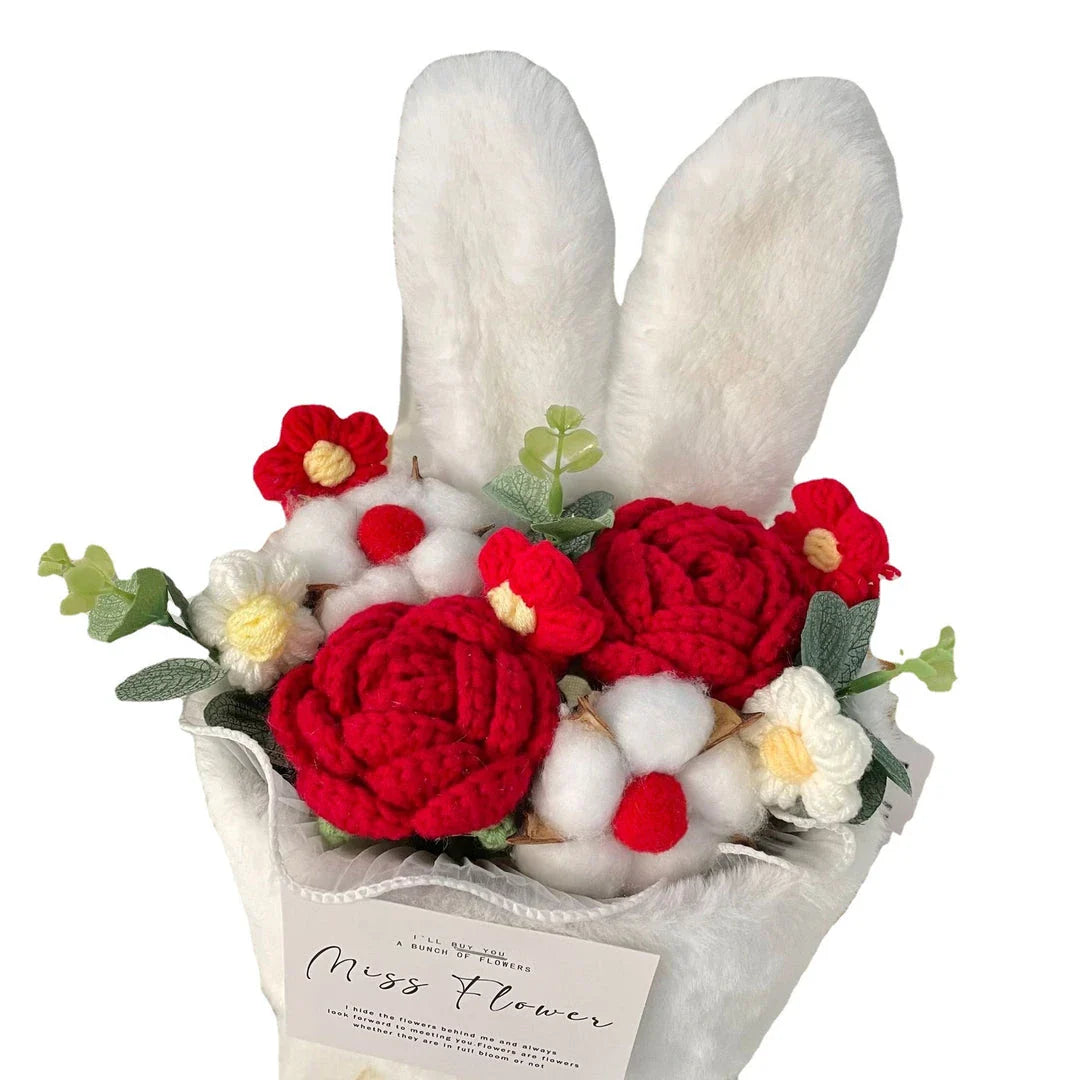 A delightful knitted rabbit bouquet doll in vibrant colours, featuring soft plush materials and a charming design
