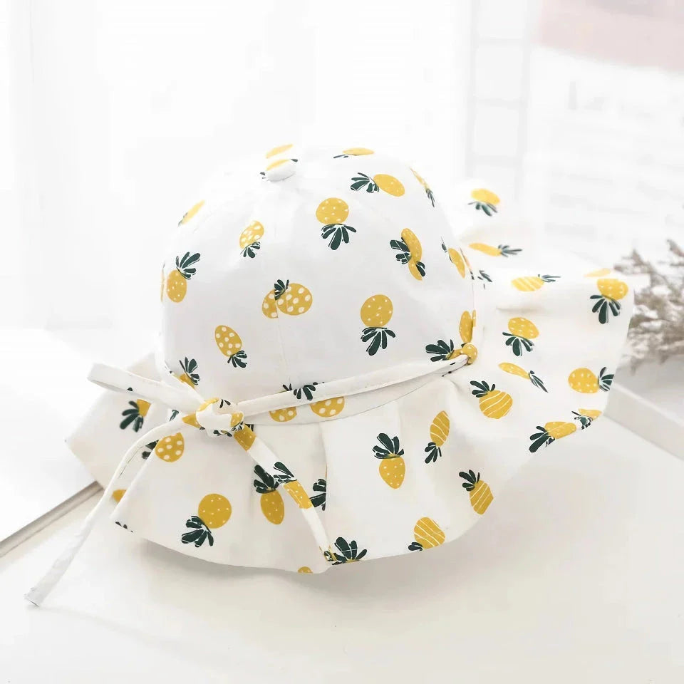 Adjustable cotton sun protection bucket hats for children with whimsical cartoon designs