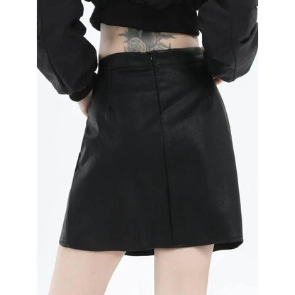 A chic faux leather high-waisted mini skirt in black, perfect for the modern British woman's autumn and winter wardrobe.
